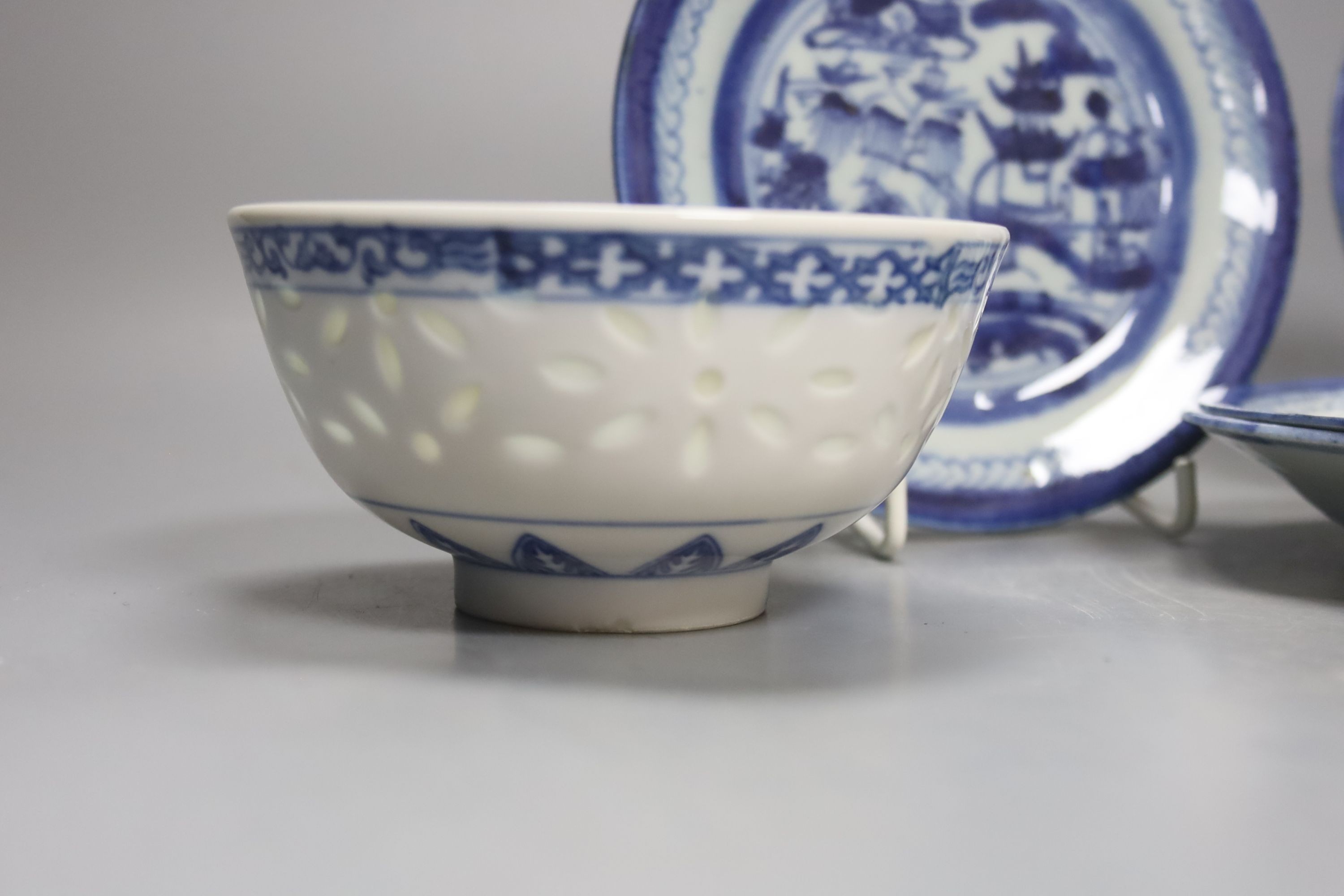Four 19th century Chinese blue and white plates and two bowls, plates 15 cms diameter.